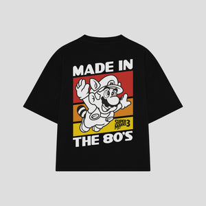 Playera streetwear premium de anime y gaming ExtraLife MX, corte boxy oversized drop shoulder heavyweight en color Deep Black y Off-White, moda urbana mexicana de culto.