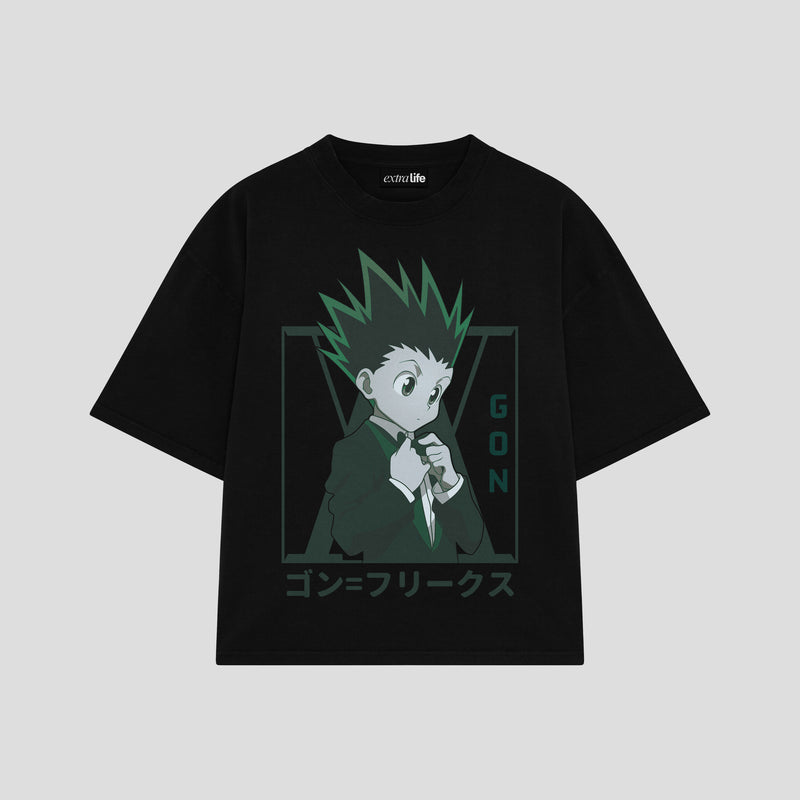 Playera streetwear premium de anime y gaming ExtraLife MX, corte boxy oversized drop shoulder heavyweight en color Deep Black y Off-White, moda urbana mexicana de culto.