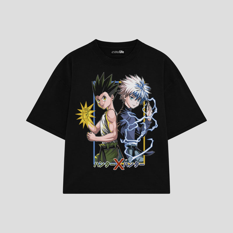 Playera streetwear premium de anime y gaming ExtraLife MX, corte boxy oversized drop shoulder heavyweight en color Deep Black y Off-White, moda urbana mexicana de culto.